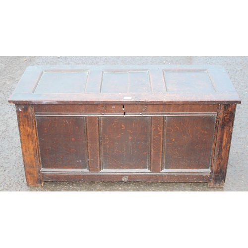 170 - An 18th century panelled oak coffer, approx 125cm wide x 53cm deep x 60cm tall