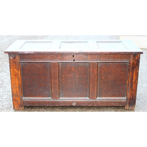 170 - An 18th century panelled oak coffer, approx 125cm wide x 53cm deep x 60cm tall