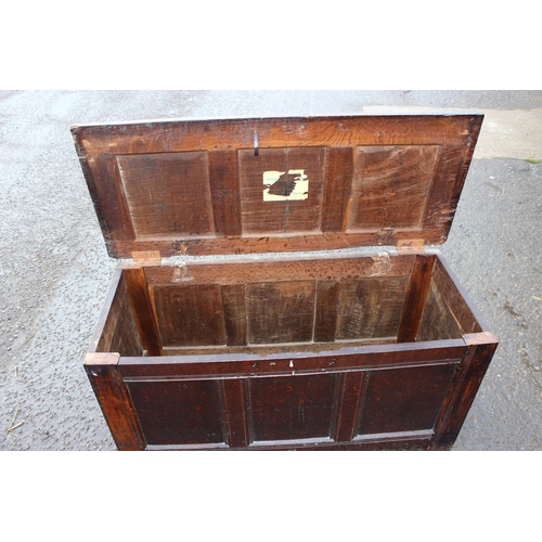 170 - An 18th century panelled oak coffer, approx 125cm wide x 53cm deep x 60cm tall