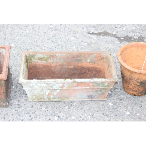 320 - 3 terracotta garden pots, largest approx 50cm wide x 24cm deep x 18cm tall