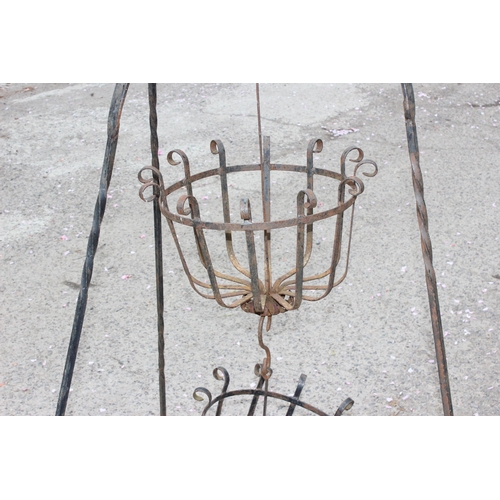 327 - 2 wirework flower baskets, approx 84cm wide x 140cm tall