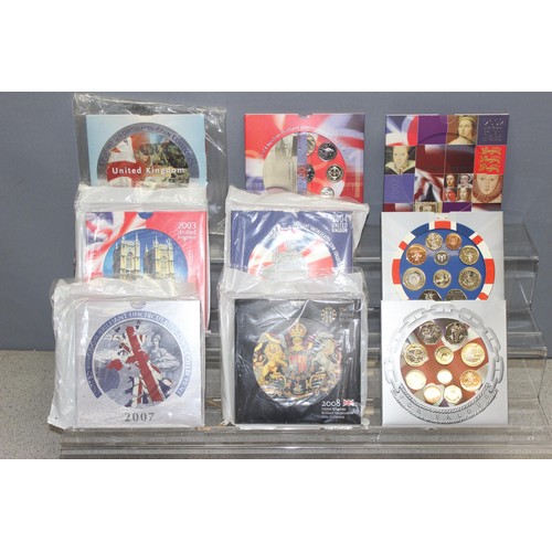 1218 - Great Britain & Northern Ireland Brilliant Uncirculated coinage sets, 9 BU coin sets in folders, 200... 