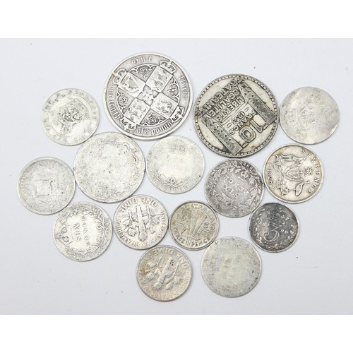 1204 - Qty of assorted mixed world and British silver coins to inc an 1883 Gothic Florin, approx 54.15g gro... 