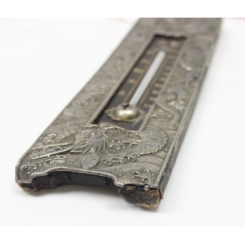 1005 - An unusual early 20th century silver plated thermometer decorated with embossed Chinese dragons, see... 