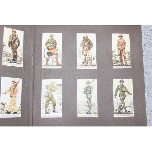 514 - 2 early 20th century cigarette card albums with contents to incl 1928 footballers, vehicles etc