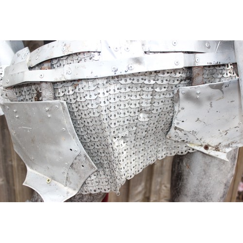 1422 - A full size medieval reenactment partial metal suit of armour, approx 73cm wide x 158cm tall, manneq... 