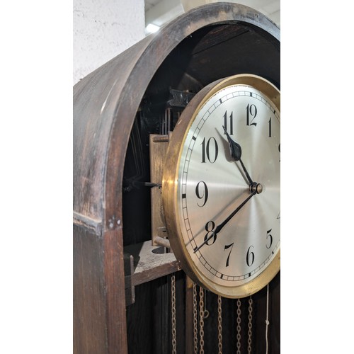 1312 - A large early 20th century grandfather clock with oak dome topped case, silvered dial and mechanical... 