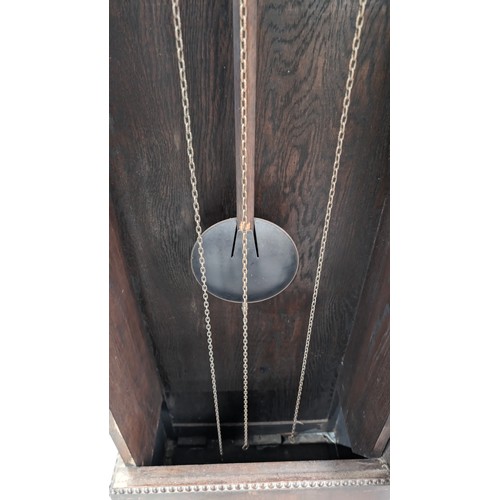 1312 - A large early 20th century grandfather clock with oak dome topped case, silvered dial and mechanical... 