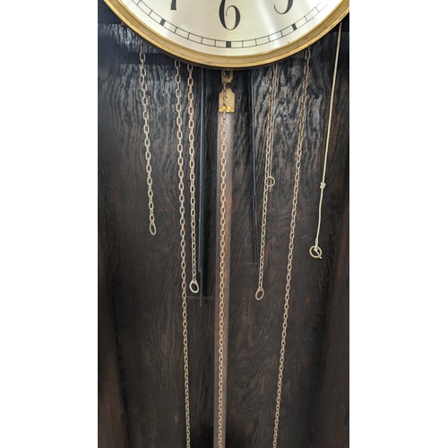 1312 - A large early 20th century grandfather clock with oak dome topped case, silvered dial and mechanical... 