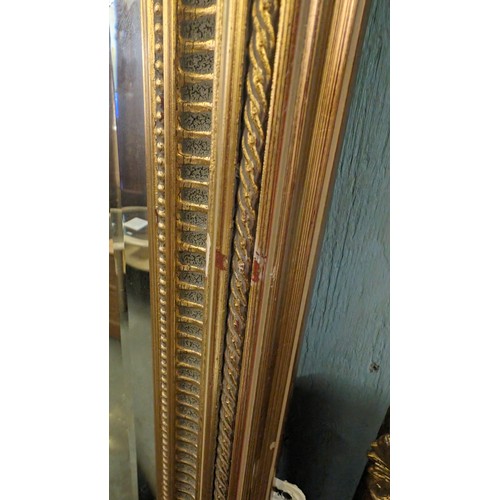 417 - An extremely large gilt framed wall mirror, approx 195cm x 135cm