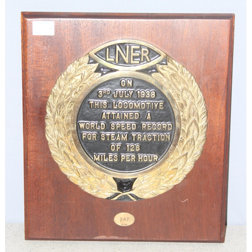 706 - A limited edition (247/250) black enamel and brass LNER commemorative plaque mounted on wooden back,... 