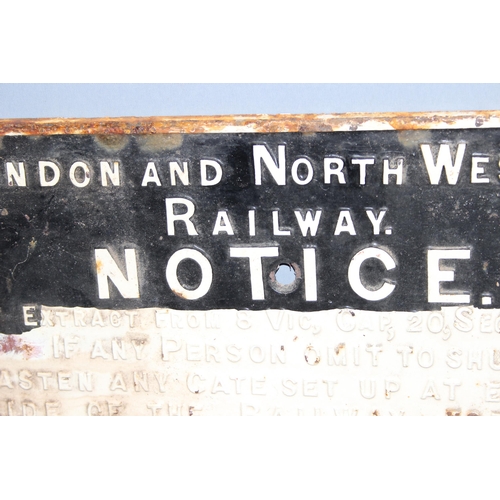 707 - Original cast iron London & North Western Railway penalty notice sign in black and white, dated 1883... 