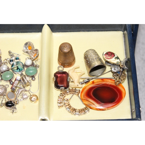 1133 - A 1977 silver jubilee jewellery box and contents to inc a number of watches and a number of silver i... 