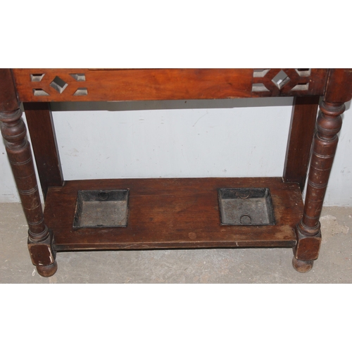 12 - A vintage oak hall stand with mirror, tiles and glove box, approx 84cm wide x 31cm x 195cm tall