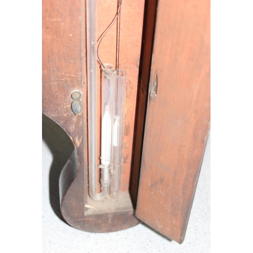 1307 - An antique mahogany cased wall barometer, approx 100cm tall