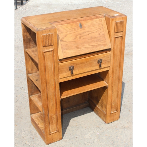 15 - An unusual Art Deco period oak bureau with built-in book shelves, approx 76cm wide x 35cm deep x 100... 