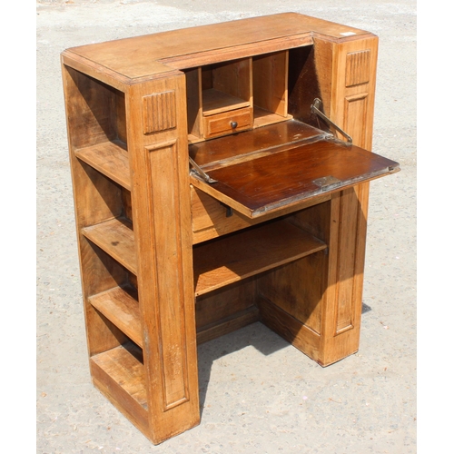 15 - An unusual Art Deco period oak bureau with built-in book shelves, approx 76cm wide x 35cm deep x 100... 