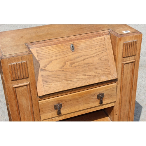 15 - An unusual Art Deco period oak bureau with built-in book shelves, approx 76cm wide x 35cm deep x 100... 