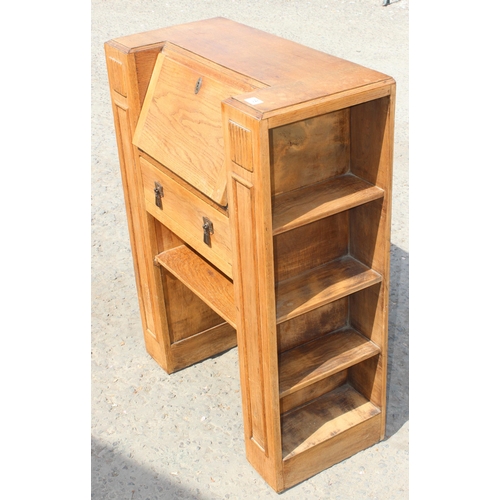 15 - An unusual Art Deco period oak bureau with built-in book shelves, approx 76cm wide x 35cm deep x 100... 