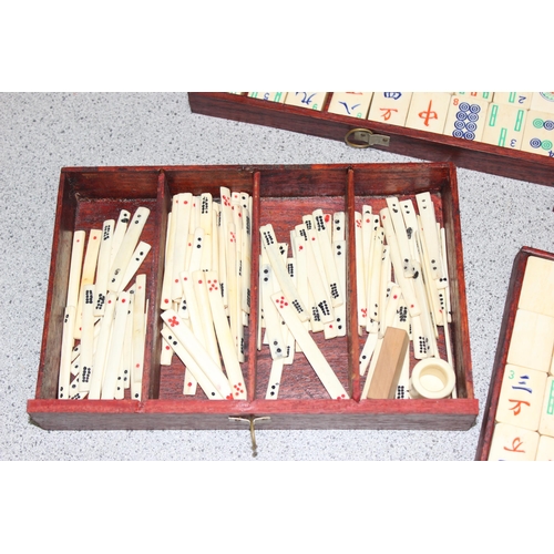 1505 - A vintage bone and bamboo Mahjong set in wooden case with a boxed set of tile holders