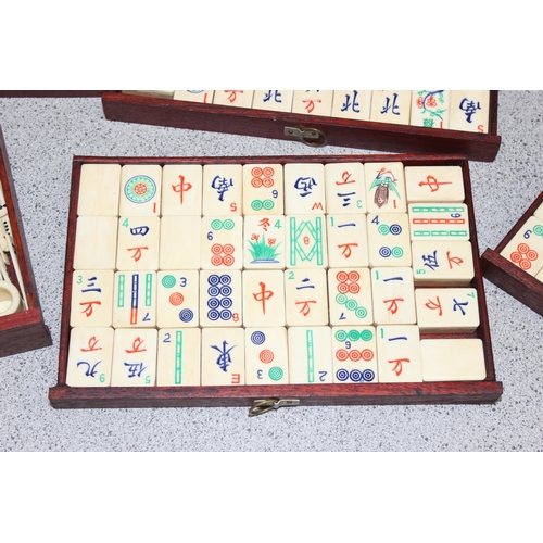 1505 - A vintage bone and bamboo Mahjong set in wooden case with a boxed set of tile holders