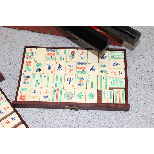 1505 - A vintage bone and bamboo Mahjong set in wooden case with a boxed set of tile holders