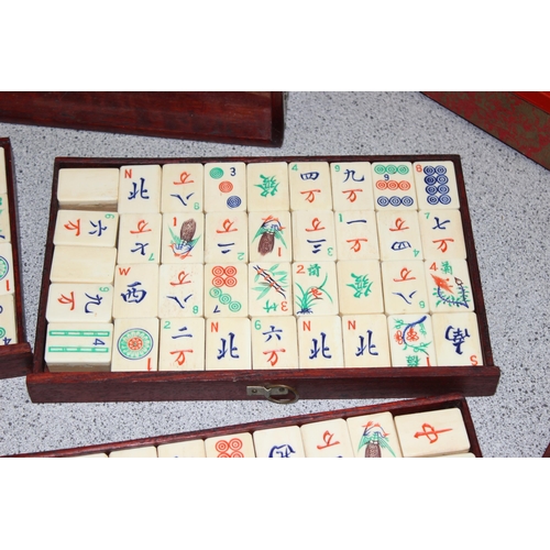 1505 - A vintage bone and bamboo Mahjong set in wooden case with a boxed set of tile holders