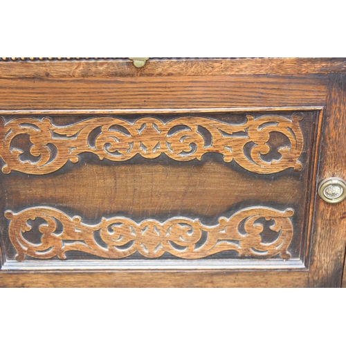 16 - An antique oak sideboard of Jacobean style with barleytwist supports, approx 121cm wide x 47cm deep ... 