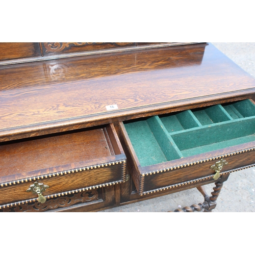 16 - An antique oak sideboard of Jacobean style with barleytwist supports, approx 121cm wide x 47cm deep ... 