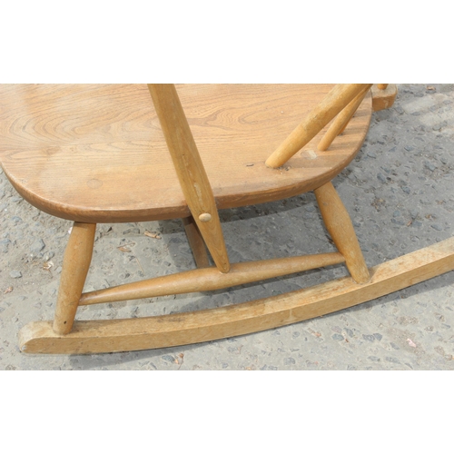 2 - A retro Ercol rocking chair, approx 75cm wide x 78cm deep x 95cm tall