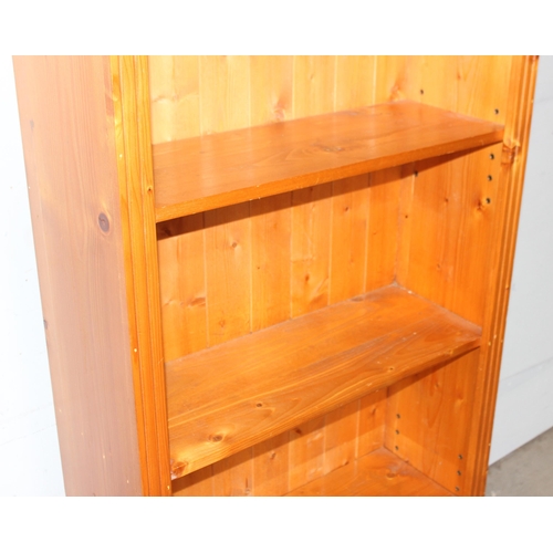 20 - A large pine bookshelf, approx 81cm wide x 33cm deep x 182cm tall