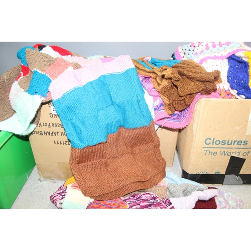 202 - 4 boxes of assorted crochet and knitted items to inc blankets etc