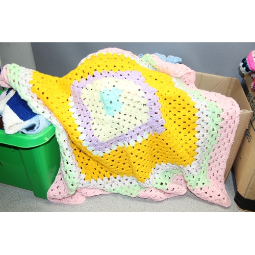 202 - 4 boxes of assorted crochet and knitted items to inc blankets etc