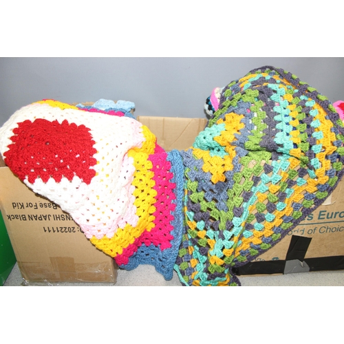 202 - 4 boxes of assorted crochet and knitted items to inc blankets etc