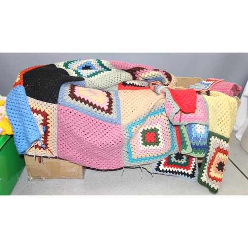 202 - 4 boxes of assorted crochet and knitted items to inc blankets etc