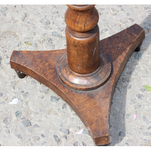 21 - An unusual antique side table with burrwood top, possibly Elm, on pedestal base, approx 41cm diamete... 