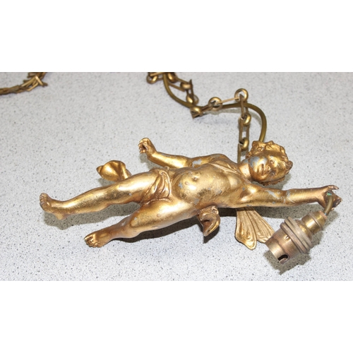 235 - 2 gilt metal hanging cherub light fittings, one a double and a single, largest approx 42cm wide x 75... 