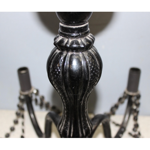 242 - Black chandelier with moulded glass body and beaded decoration, approx 41cm H