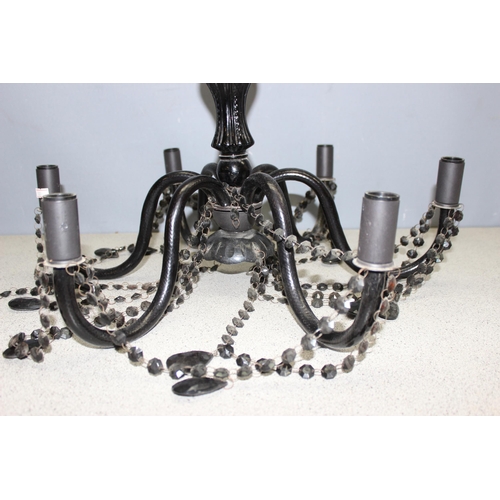 242 - Black chandelier with moulded glass body and beaded decoration, approx 41cm H