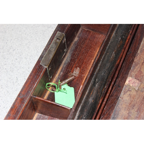 272 - An antique mahogany writing slope with brass bound corners, approx 40cm wide