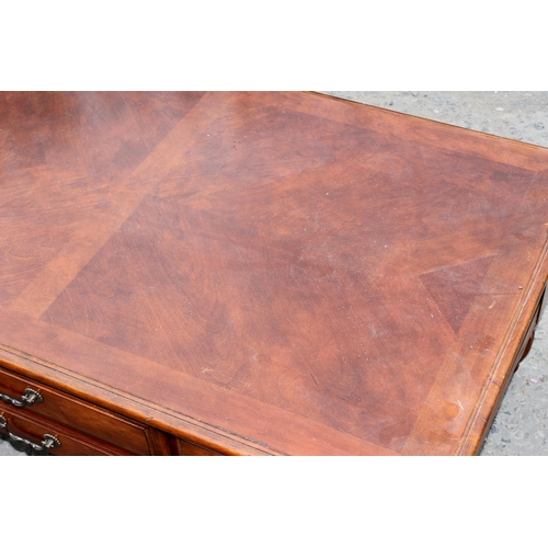 28 - A good quality modern mahogany coffee table, approx 122cm wide x 70cm deep x 48cm tall