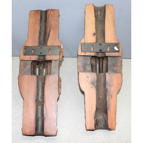 282 - Pair of heavy carved wood candle wall sconces formed from cartwheel hubs, approx 52cm