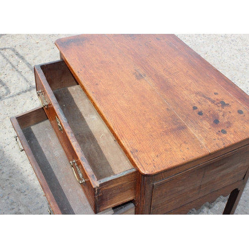 4 - A Georgian 2 drawer oak lowboy with brass fittings, likely 2nd half 18th century, approx 74cm wide x... 