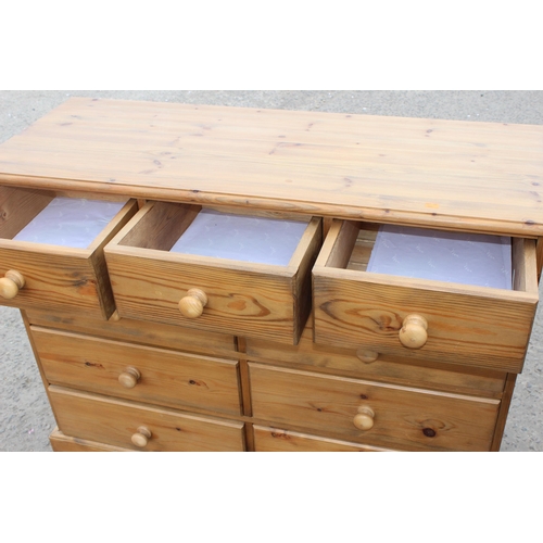 58 - An unusual modern pine 3 over 6 multi-drawer chest of drawers, approx 116cm wide x 49cm deep x 90cm ... 