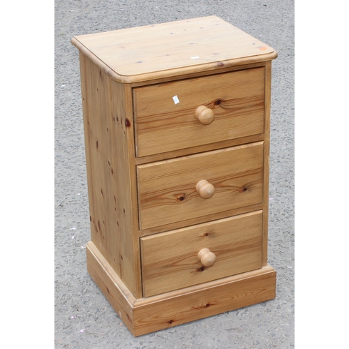 57 - A pine 3 drawer bedside table, approx 46cm wide x 40cm deep x 77cm tall