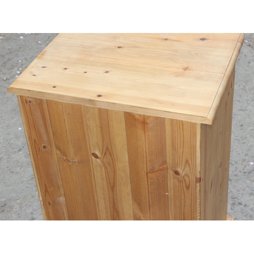 57 - A pine 3 drawer bedside table, approx 46cm wide x 40cm deep x 77cm tall