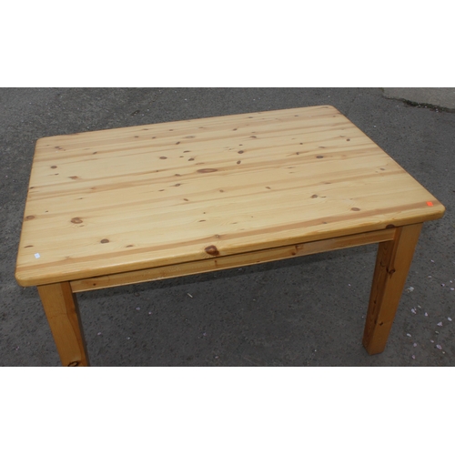 55 - A contemporary pine farmhouse kitchen table, approx 131cm wide x 91cm deep x 77cm tall