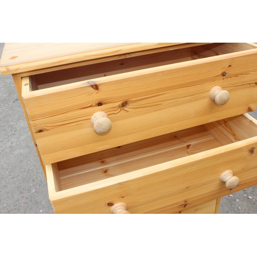 54 - A modern pine 5 drawer chest of drawers, approx 76cm wide x 45cm deep x 129cm tall