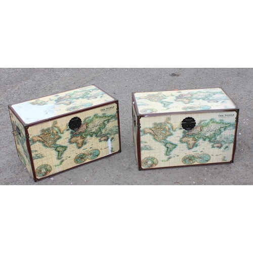 60 - 2 trunks with map design, each approx 68cm wide x 40cm deep x 45cm tall