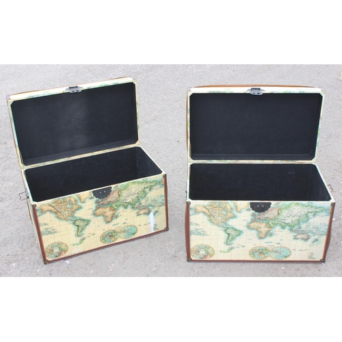 60 - 2 trunks with map design, each approx 68cm wide x 40cm deep x 45cm tall